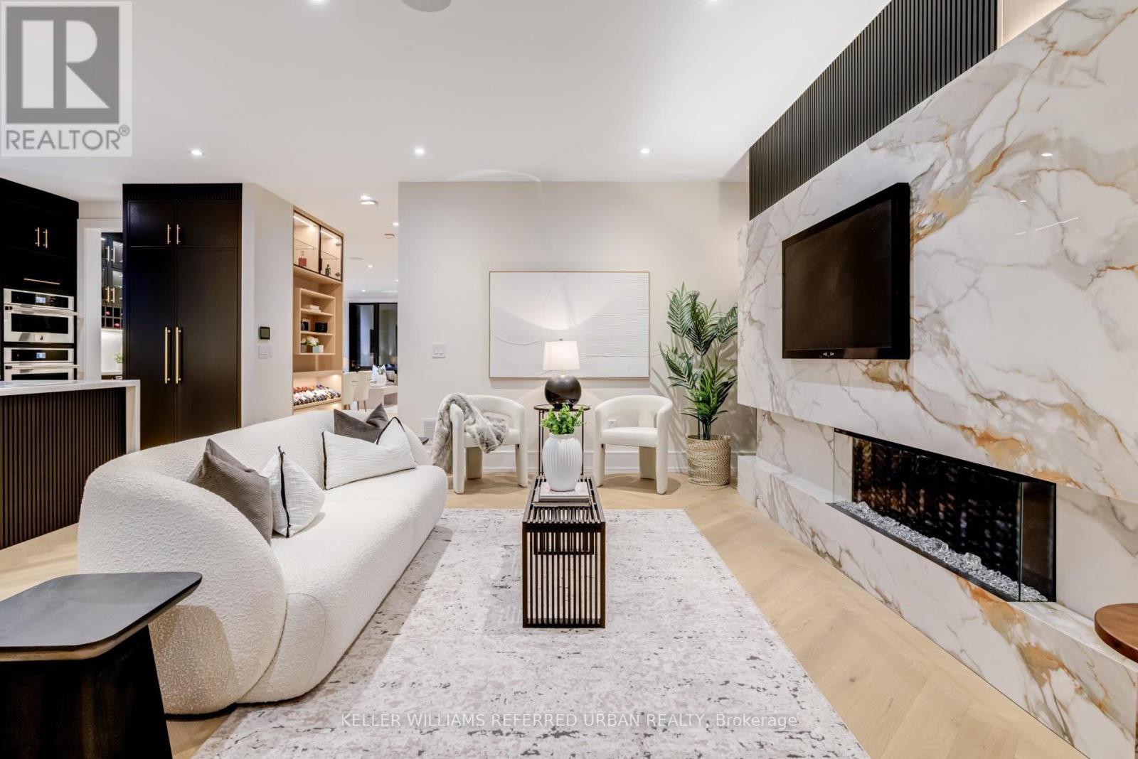 33 Twelfth Street, Toronto, ON - Indoor Photo Showing Living Room With Fireplace
