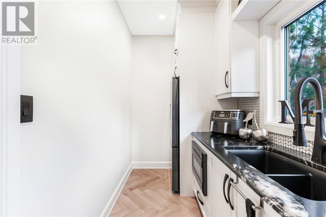 20 Breezehill Road, Skead, ON - Indoor Photo Showing Kitchen With Double Sink