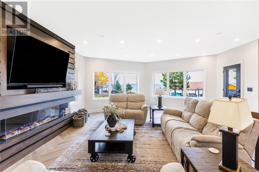 20 Breezehill Road, Skead, ON - Indoor Photo Showing Living Room With Fireplace