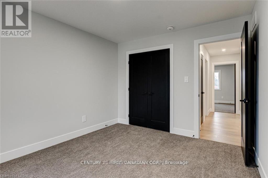 129 Aspen Circle, Thames Centre (Thorndale), ON - Indoor Photo Showing Other Room