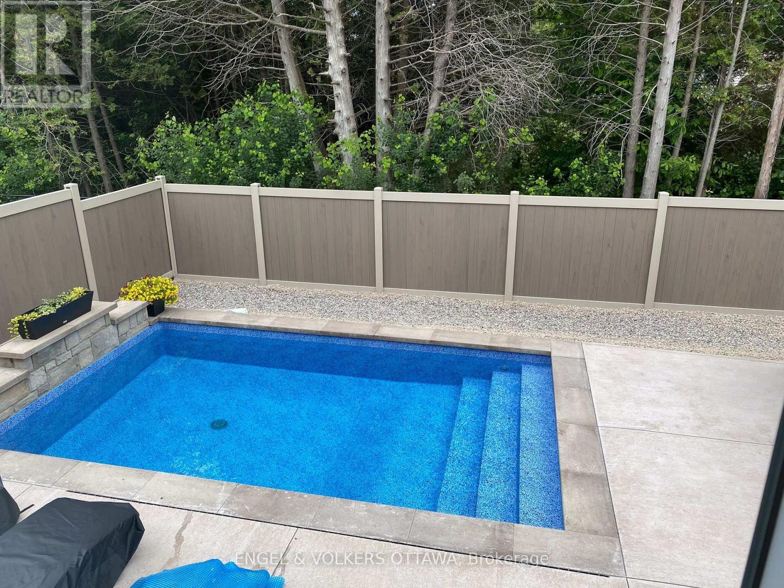 221 Blackhorse Drive, North Grenville, ON - Outdoor With In Ground Pool