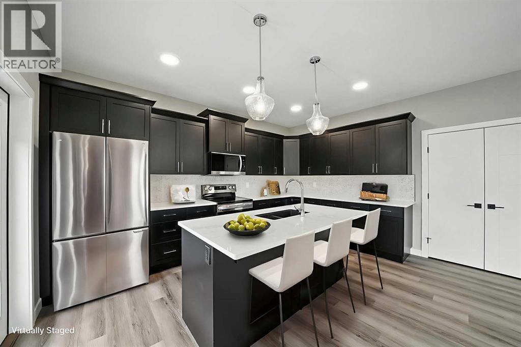 25 Murphy Close, Blackfalds, AB - Indoor Photo Showing Kitchen With Upgraded Kitchen