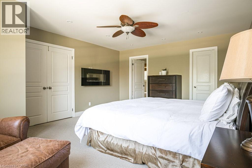 Carpeted bedroom featuring ceiling fan, baseboards, recessed lighting, and a closet - 330 Strathcona Drive, Burlington, ON - Indoor Photo Showing Bedroom