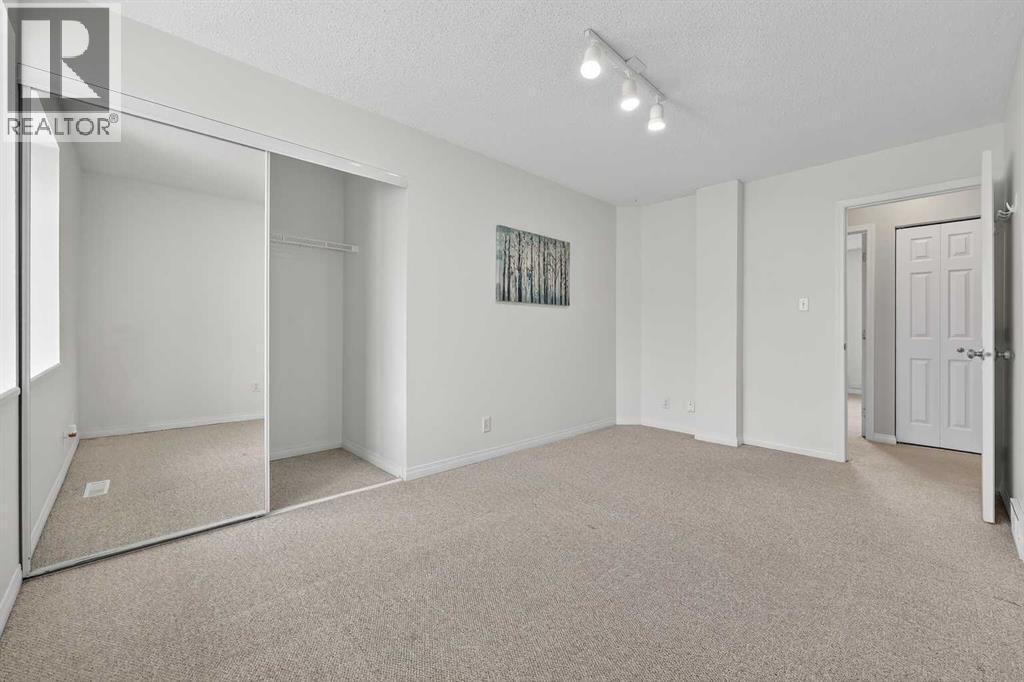 115, 4810 40 Avenue Sw, Calgary, AB - Indoor Photo Showing Other Room