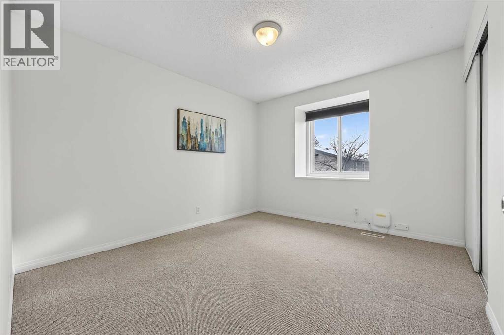 115, 4810 40 Avenue Sw, Calgary, AB - Indoor Photo Showing Other Room