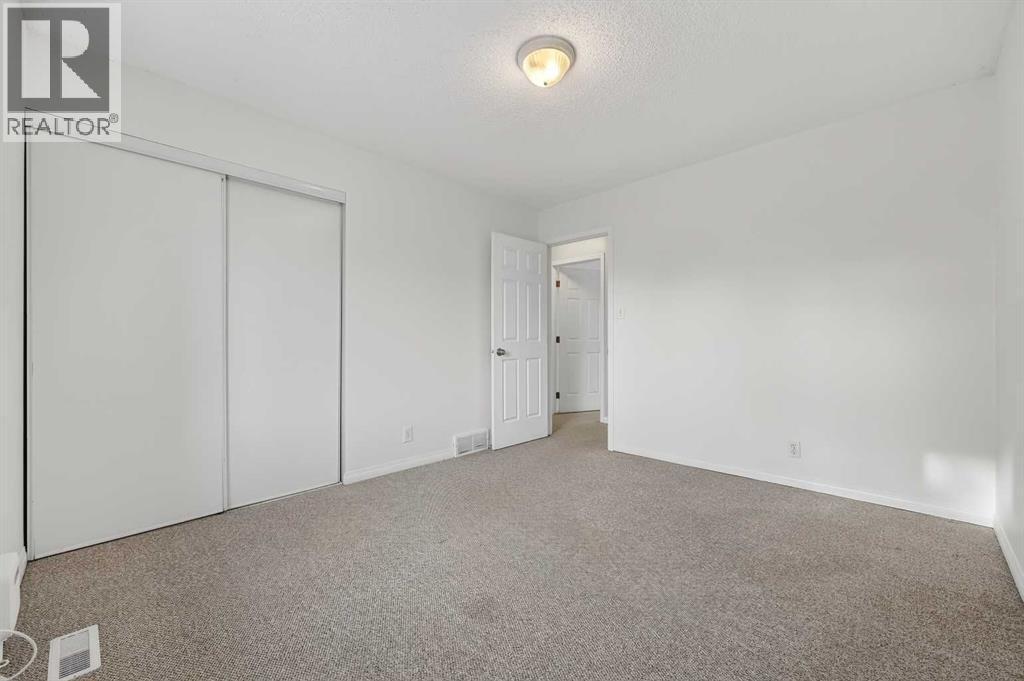 115, 4810 40 Avenue Sw, Calgary, AB - Indoor Photo Showing Other Room