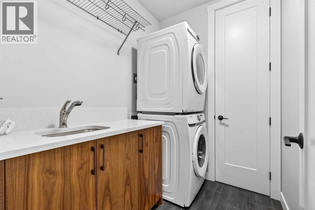 402, 21 Lebel Crescent Nw, Calgary, AB - Indoor Photo Showing Laundry Room