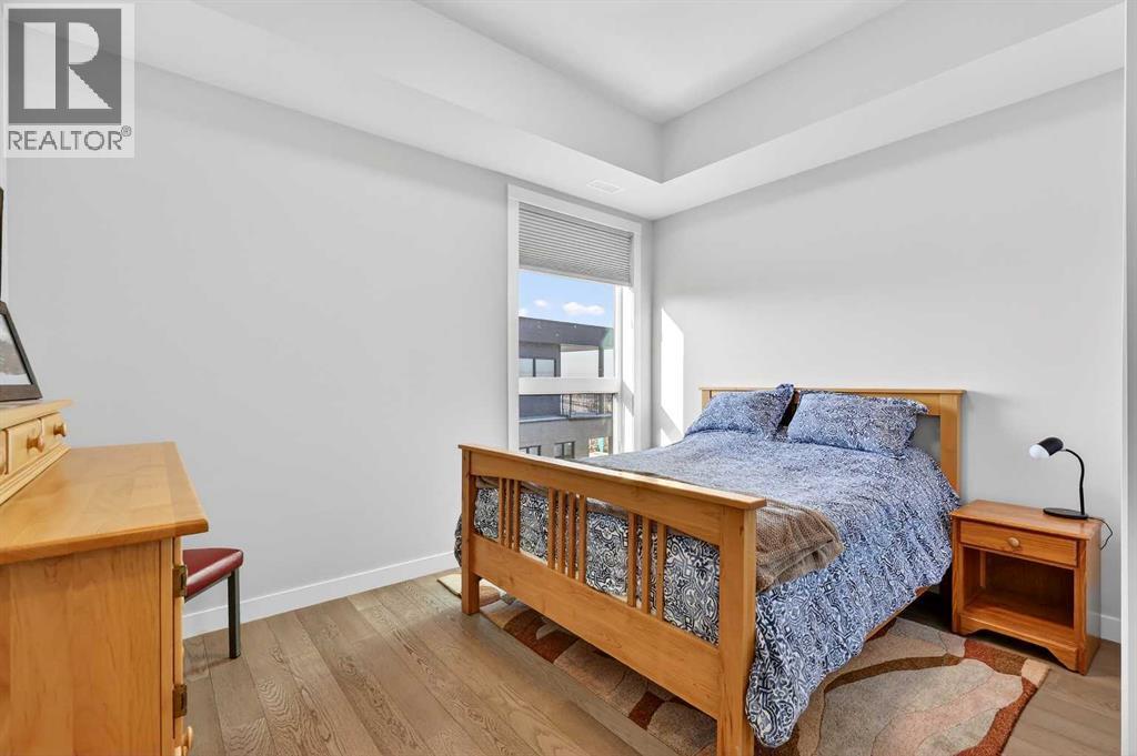402, 21 Lebel Crescent Nw, Calgary, AB - Indoor Photo Showing Bedroom