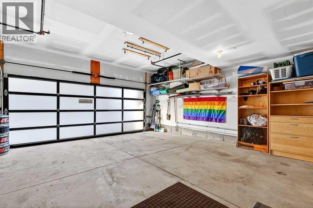 402, 21 Lebel Crescent Nw, Calgary, AB - Indoor Photo Showing Garage