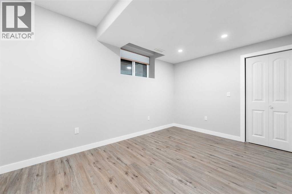 Fifth bedroom in the basement.. - 70 Royal Ridge Manor Nw, Calgary, AB - Indoor Photo Showing Other Room