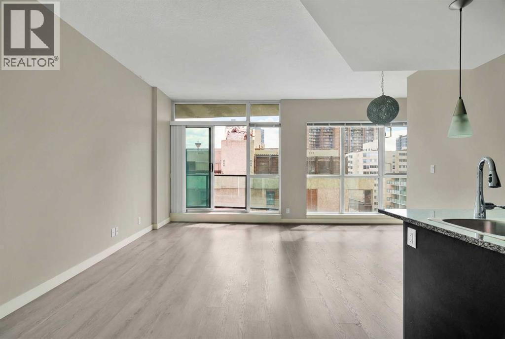 Bright and Spacious Living Room with Floor to Ceiling Windows - 701, 788 12 Avenue Sw, Calgary, AB - Indoor Photo Showing Other Room