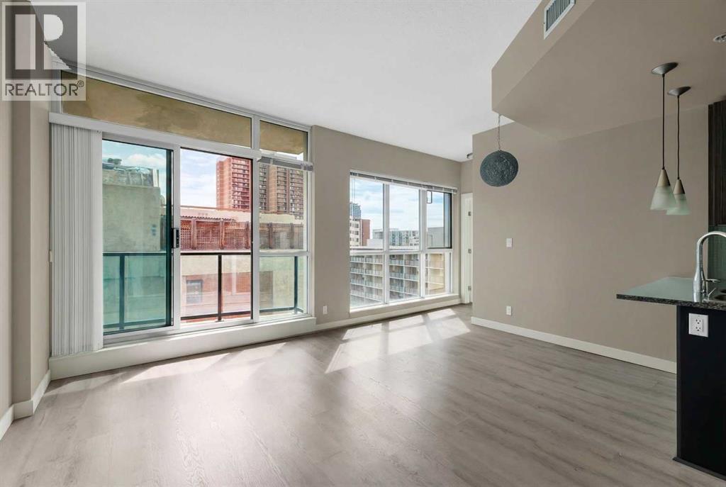 Bright and Spacious Living Room and Dining Room - 701, 788 12 Avenue Sw, Calgary, AB - Indoor Photo Showing Other Room