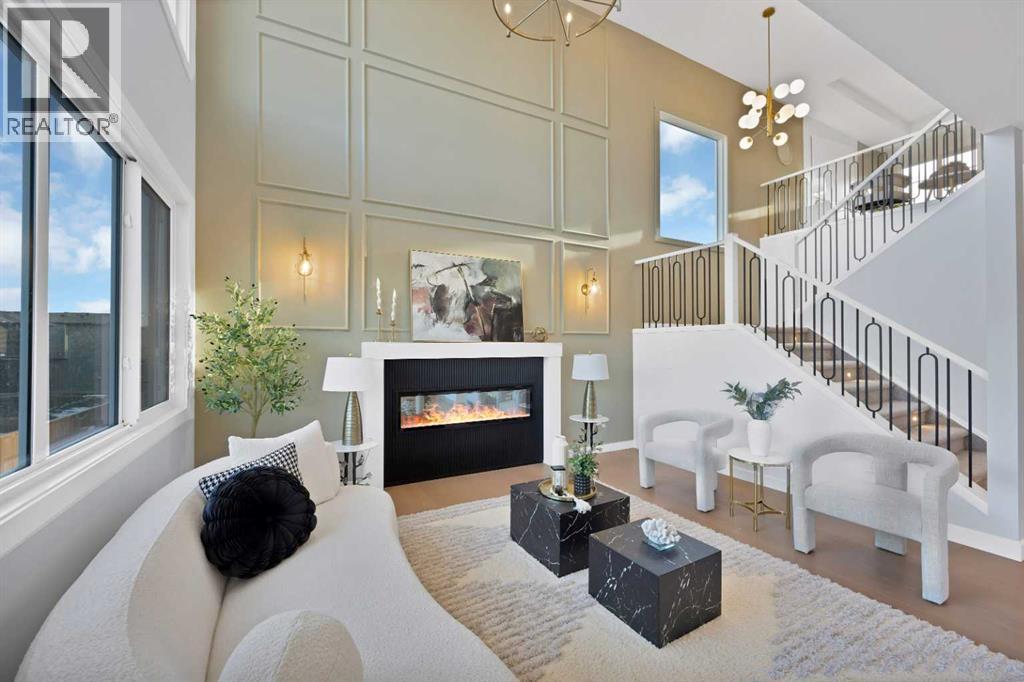 351 Waterford Grove, Chestermere, AB - Indoor Photo Showing Living Room With Fireplace