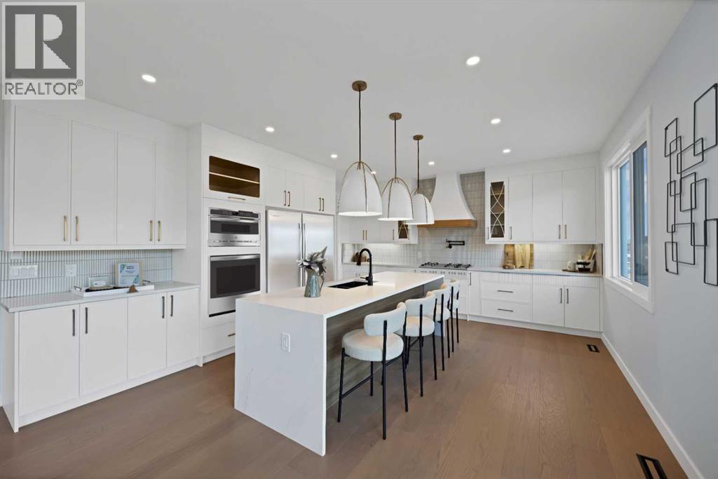 351 Waterford Grove, Chestermere, AB - Indoor Photo Showing Kitchen With Upgraded Kitchen