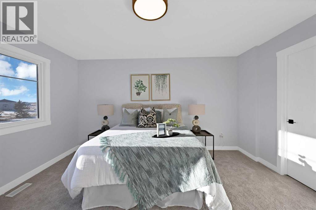 351 Waterford Grove, Chestermere, AB - Indoor Photo Showing Bedroom