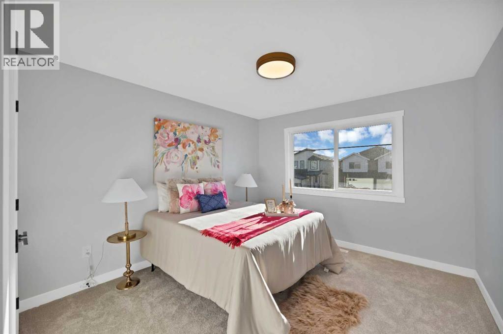 351 Waterford Grove, Chestermere, AB - Indoor Photo Showing Bedroom