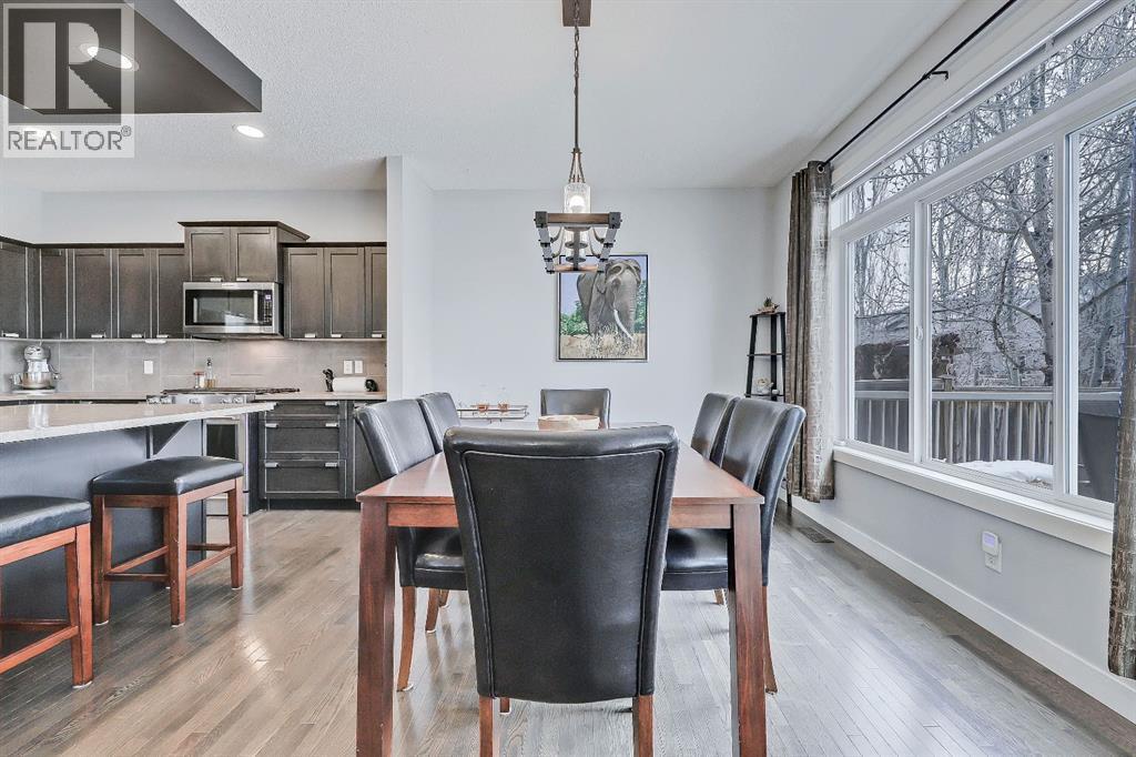 Updated lighting - 9 Copperleaf Way Se, Calgary, AB - Indoor Photo Showing Dining Room