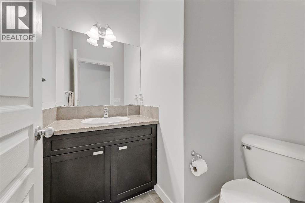 Powder room - 9 Copperleaf Way Se, Calgary, AB - Indoor Photo Showing Bathroom