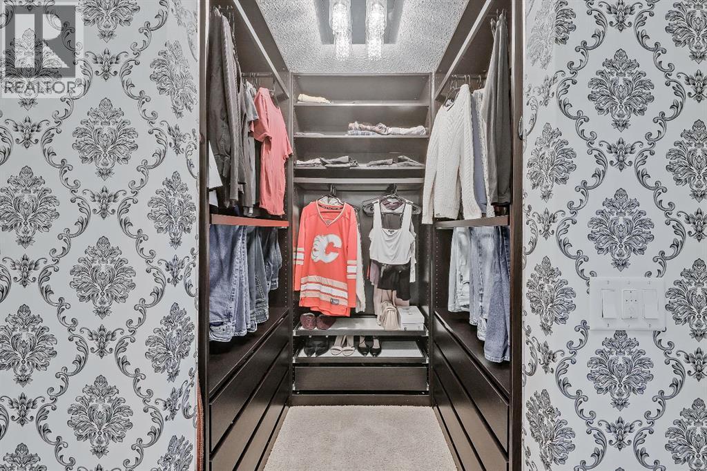 Closet organizers - 9 Copperleaf Way Se, Calgary, AB - Indoor With Storage