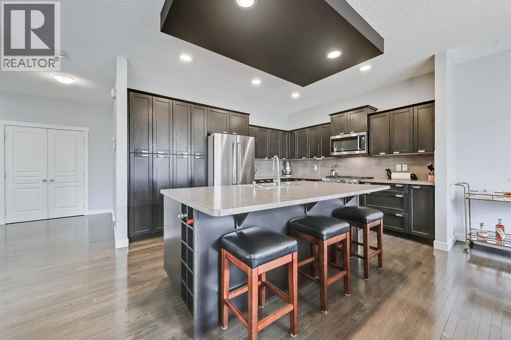 Massive kitchen for entertaining - 9 Copperleaf Way Se, Calgary, AB - Indoor Photo Showing Kitchen With Stainless Steel Kitchen With Upgraded Kitchen