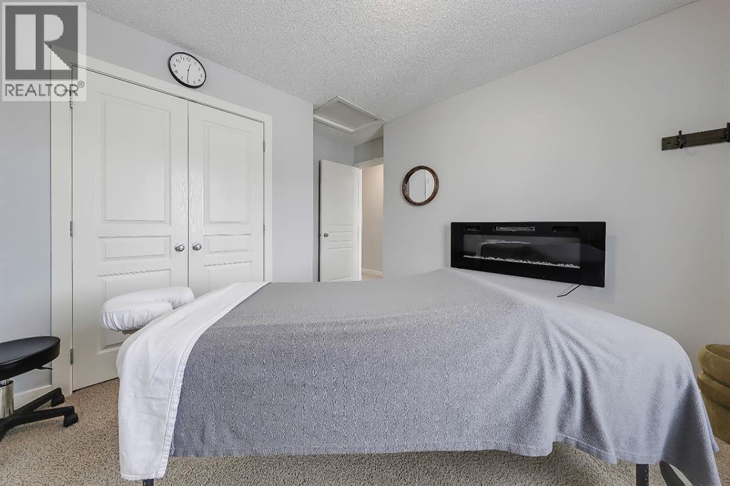 3rd bedroom - 9 Copperleaf Way Se, Calgary, AB - Indoor Photo Showing Bedroom
