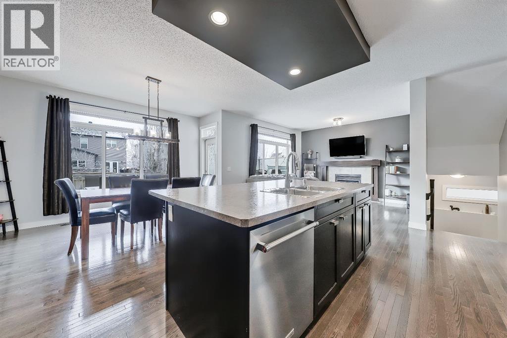 Oversize island - 9 Copperleaf Way Se, Calgary, AB - Indoor Photo Showing Kitchen