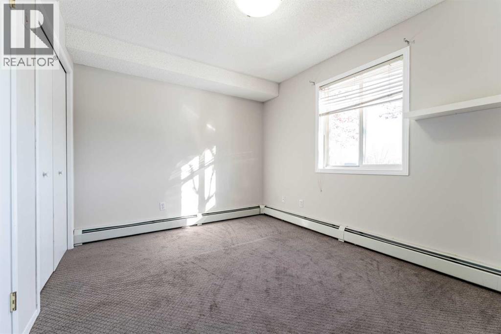 102, 1717 60 Street Se, Calgary, AB - Indoor Photo Showing Other Room