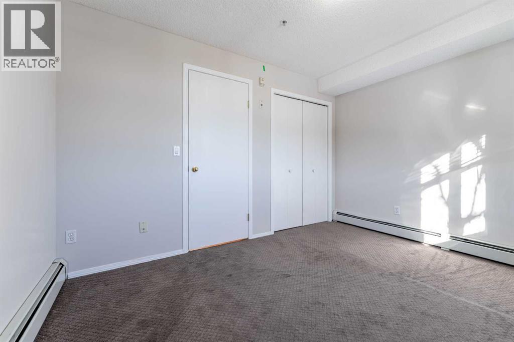 102, 1717 60 Street Se, Calgary, AB - Indoor Photo Showing Other Room