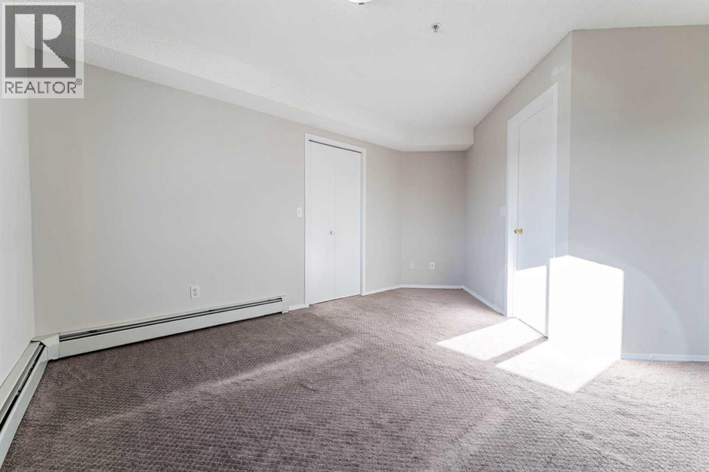 102, 1717 60 Street Se, Calgary, AB - Indoor Photo Showing Other Room