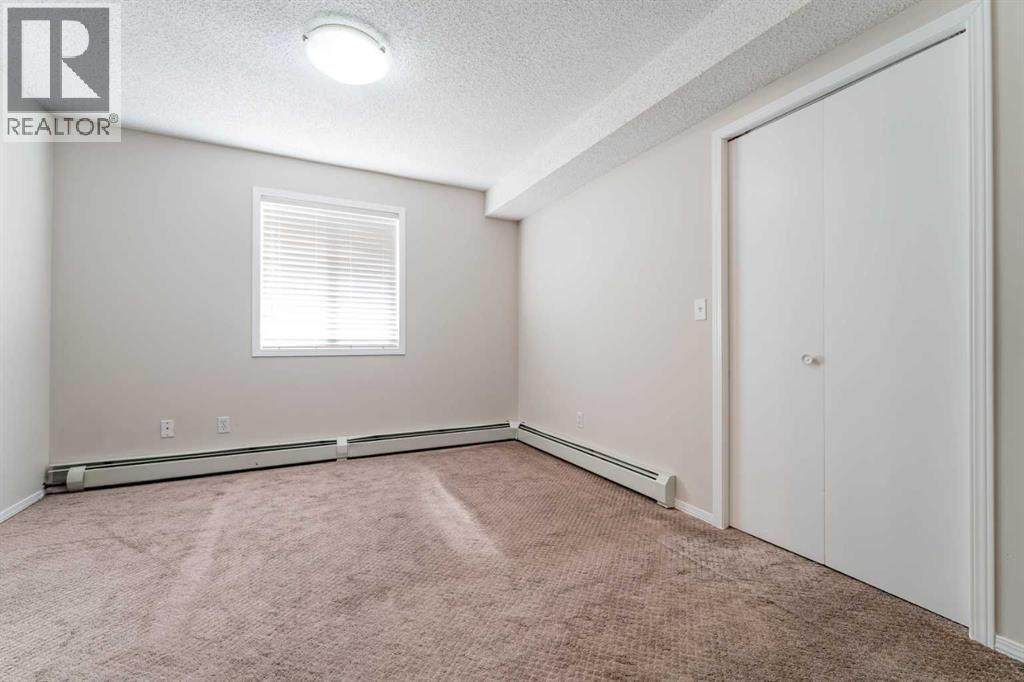 102, 1717 60 Street Se, Calgary, AB - Indoor Photo Showing Other Room