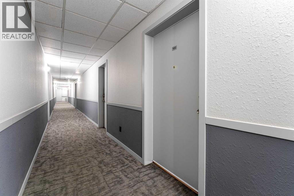 102, 1717 60 Street Se, Calgary, AB - Indoor Photo Showing Other Room