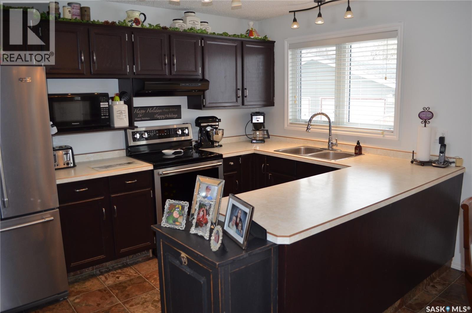 394 Standard Street, Pennant, SK - Indoor Photo Showing Kitchen With Double Sink