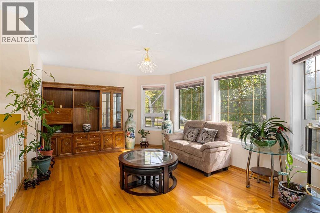 218 15 Avenue Nw, Calgary, AB - Indoor Photo Showing Living Room With Fireplace