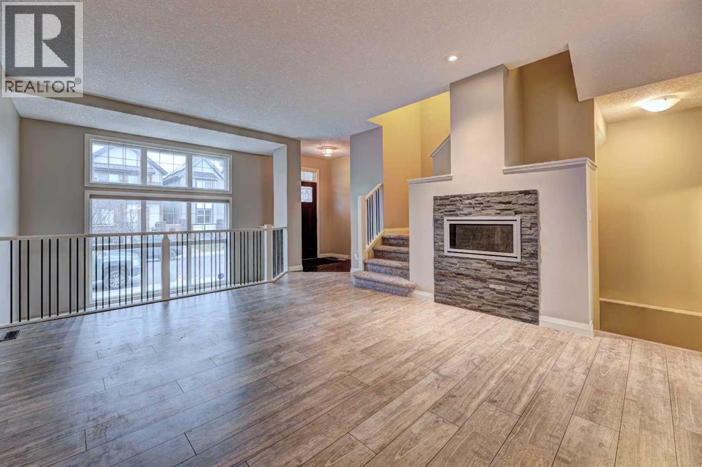 70 Masters Crescent Se, Calgary, AB - Indoor With Fireplace