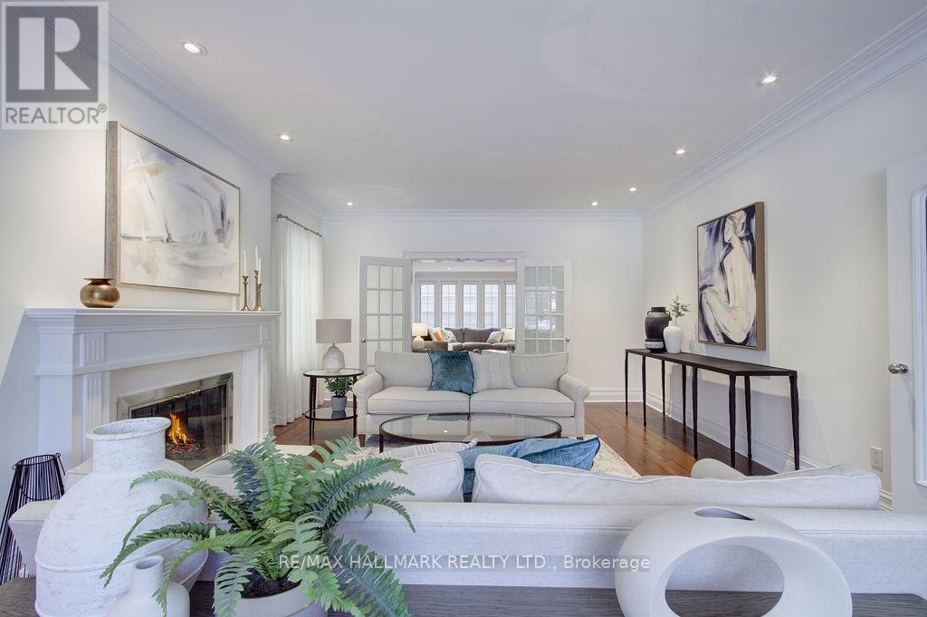 19 Whitney Avenue, Toronto, ON - Indoor Photo Showing Living Room With Fireplace