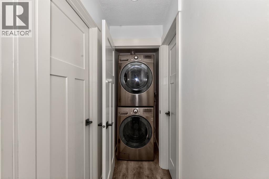 Main floor laundry - 432 Ogden Drive Se, Calgary, AB - Indoor Photo Showing Laundry Room
