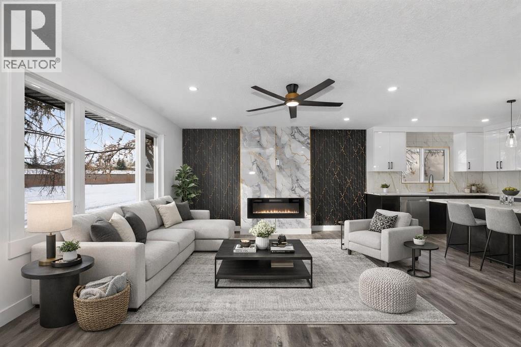 432 Ogden Drive Se, Calgary, AB - Indoor Photo Showing Living Room With Fireplace
