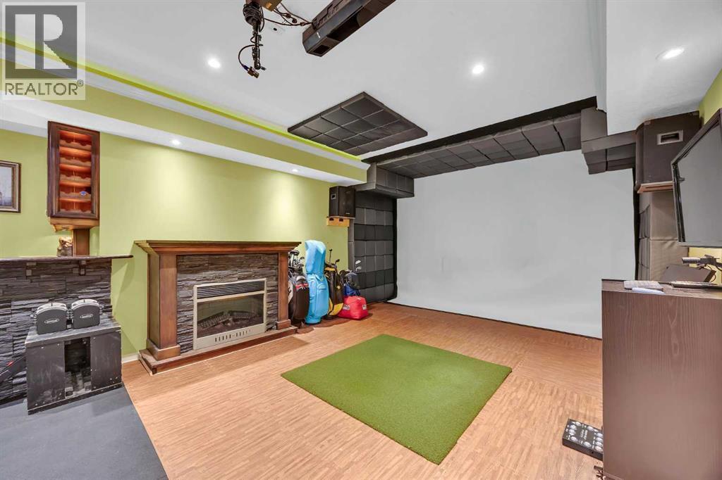 100 Cougarstone Manor Sw, Calgary, AB - Indoor With Fireplace