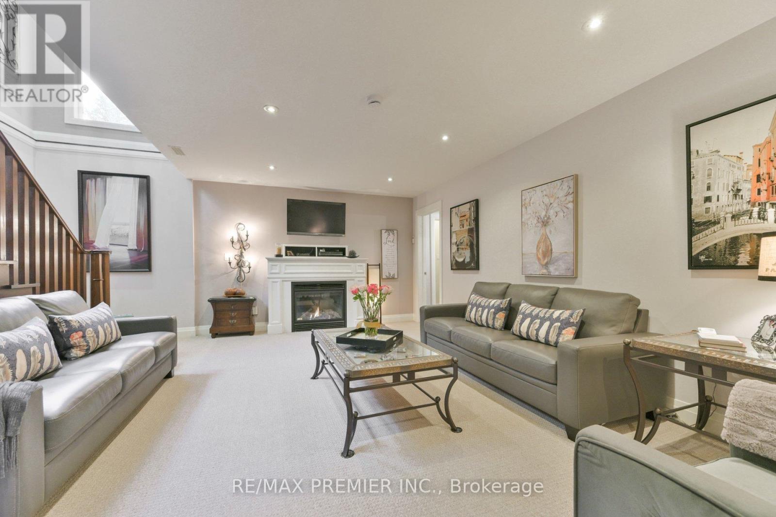 2 Hilltop Court, Springwater, ON - Indoor Photo Showing Living Room With Fireplace
