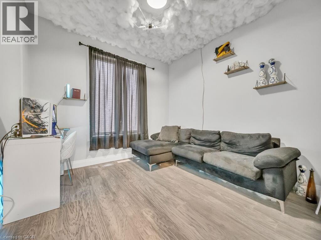 Living area featuring wood finished floors - 3374 Oriole Drive, London, ON - Indoor Photo Showing Living Room