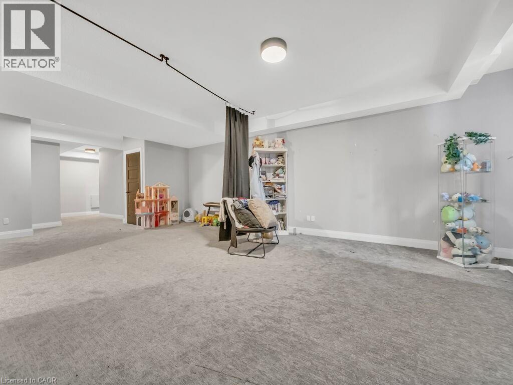 Game room featuring carpet and baseboards - 3374 Oriole Drive, London, ON - Indoor Photo Showing Other Room