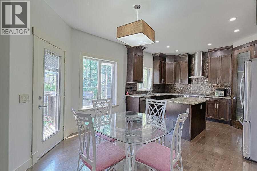 16 Rockcliff Point Nw, Calgary, AB - Indoor Photo Showing Other Room