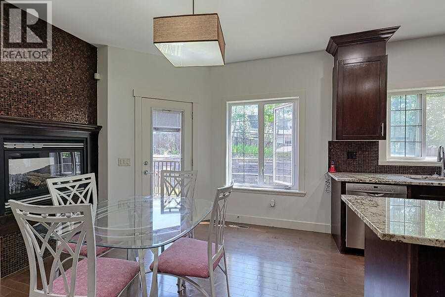16 Rockcliff Point Nw, Calgary, AB - Indoor Photo Showing Dining Room