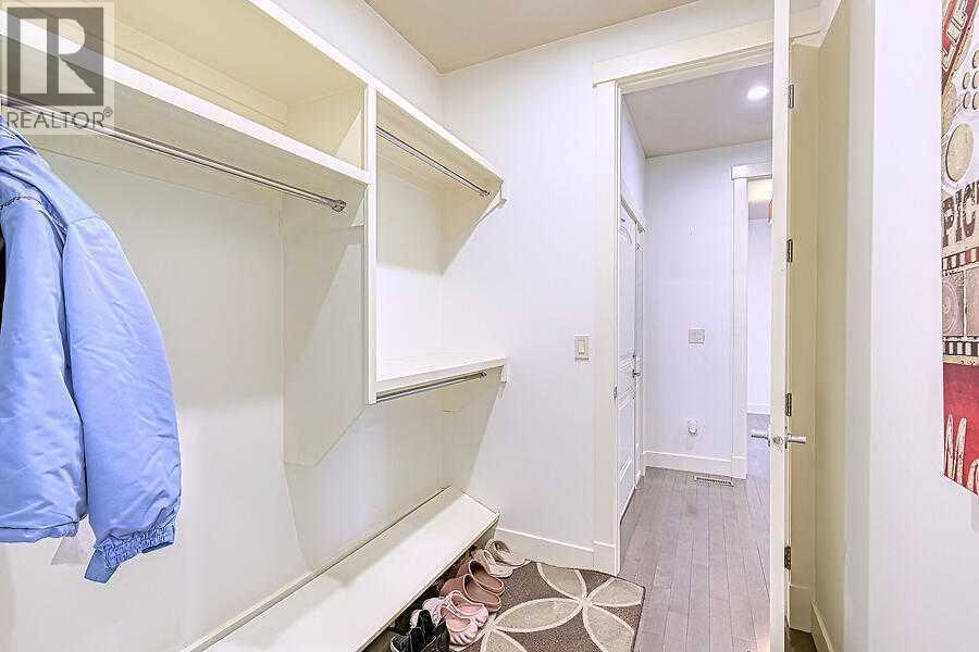 16 Rockcliff Point Nw, Calgary, AB - Indoor With Storage