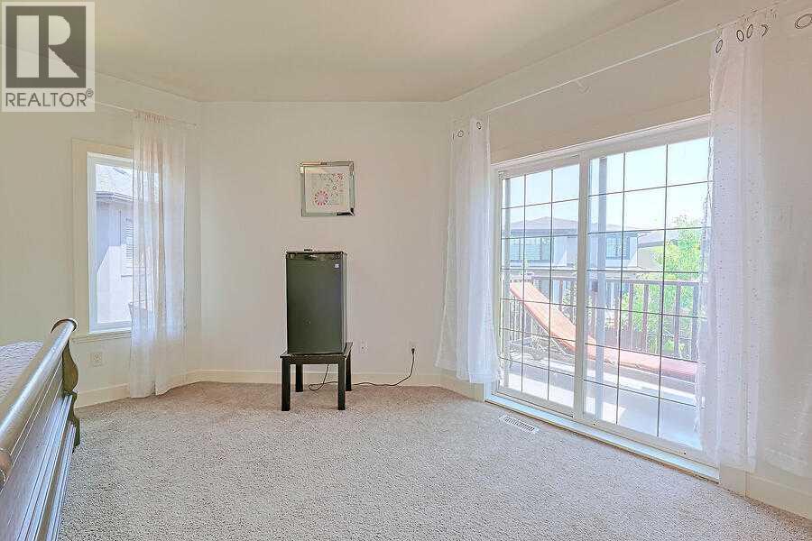 16 Rockcliff Point Nw, Calgary, AB - Indoor Photo Showing Other Room