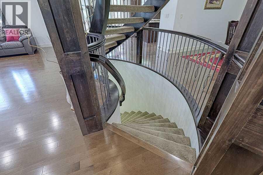 16 Rockcliff Point Nw, Calgary, AB - Indoor Photo Showing Other Room