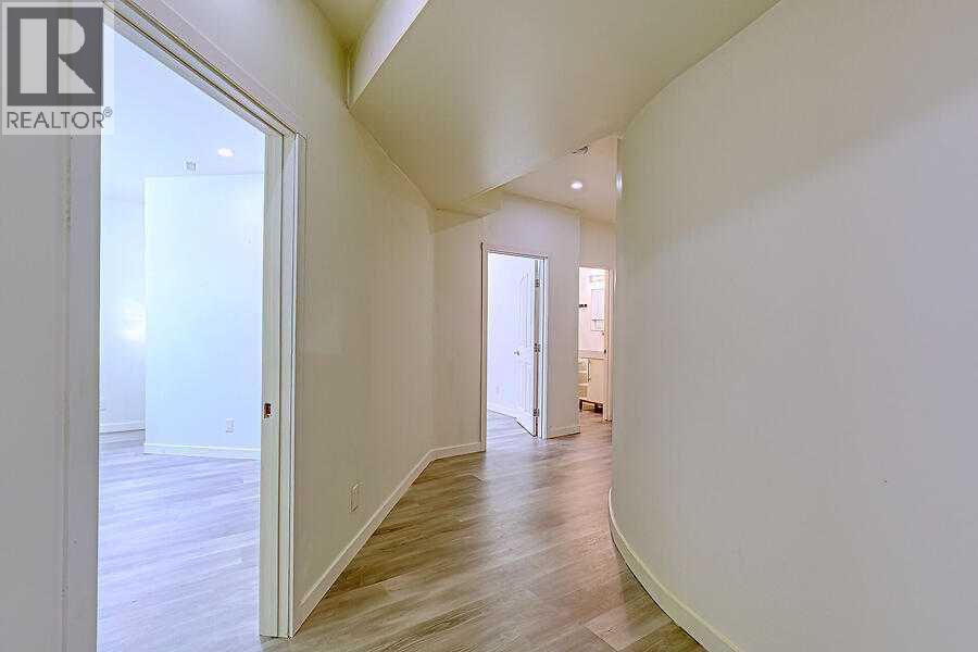 16 Rockcliff Point Nw, Calgary, AB - Indoor Photo Showing Other Room
