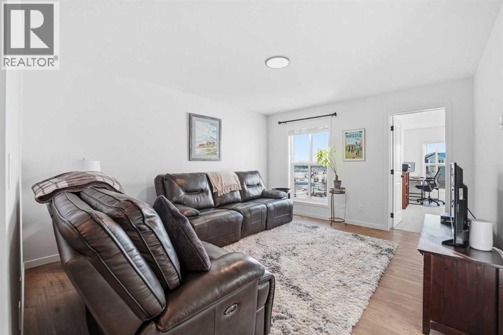 102 Setonstone Manor Se, Calgary, AB - Indoor Photo Showing Living Room