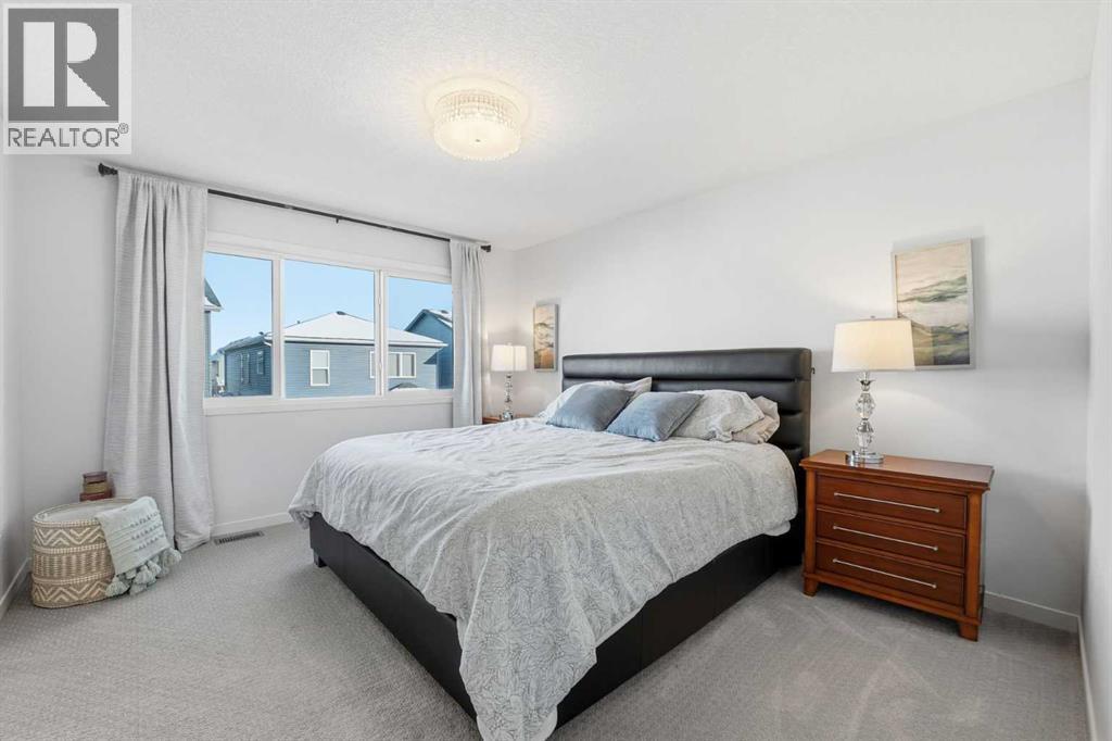 102 Setonstone Manor Se, Calgary, AB - Indoor Photo Showing Bedroom