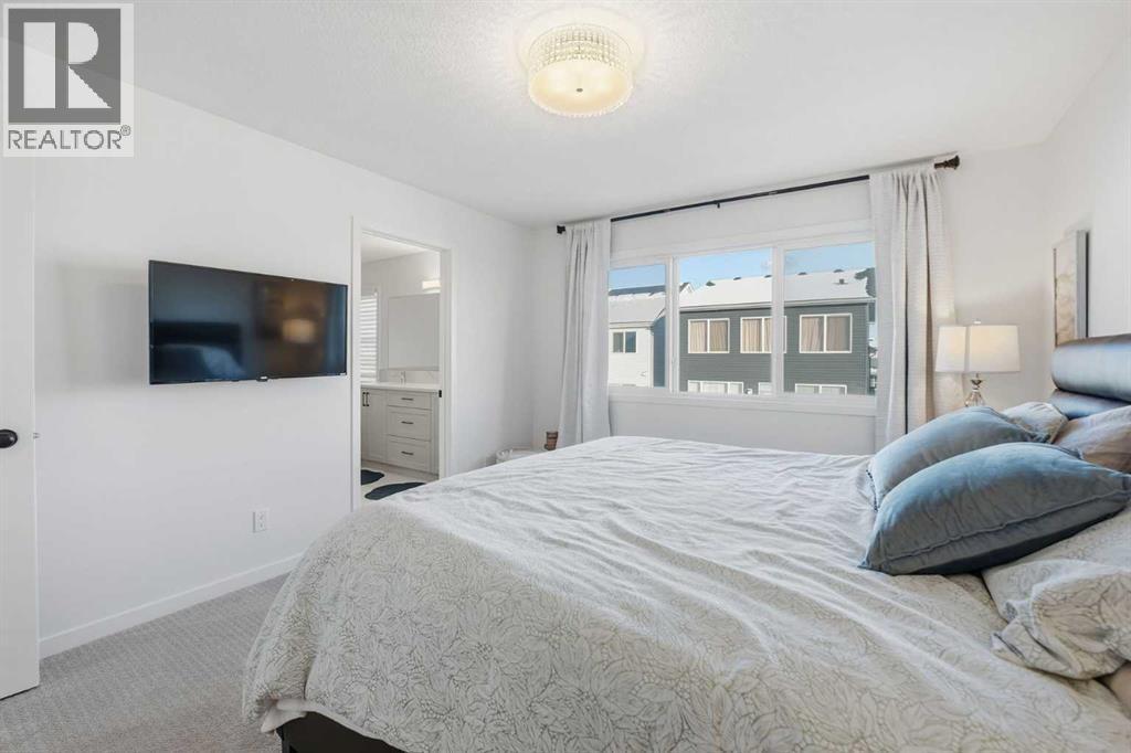 102 Setonstone Manor Se, Calgary, AB - Indoor Photo Showing Bedroom
